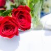 2 Eternity Roses on Table tied Together